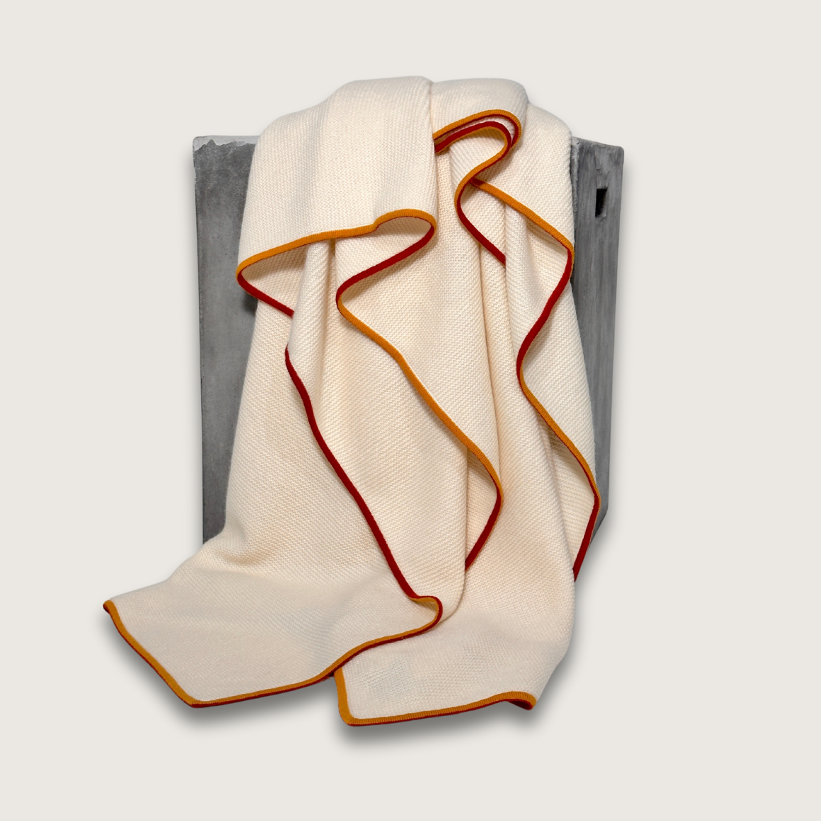 Fine Purl Knit Cashmere Throw in Cream with Fire Brick & Gold