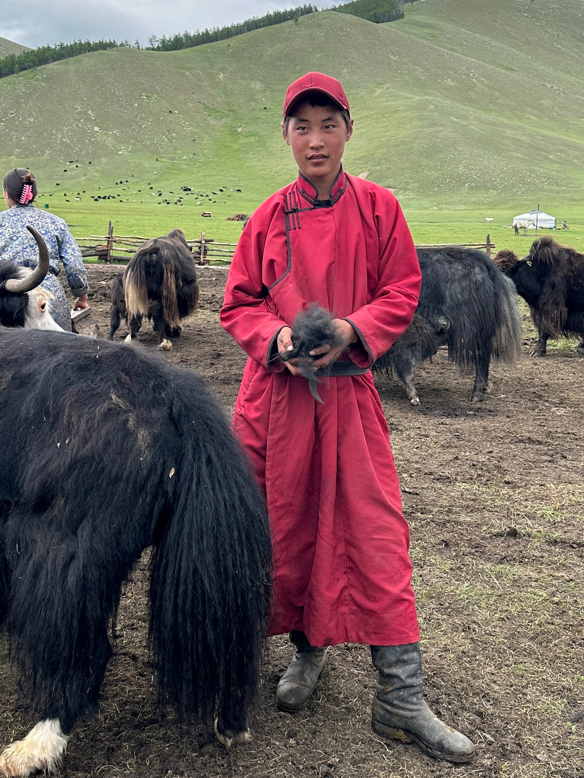 Young Mongolian Yak Herder in red